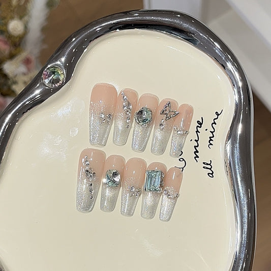 Handmade nails,cool style,silver shining nails,cat eye armor,long  stiletto,diamond and butterfly,reusable,aily banquets are acceptable,for every one